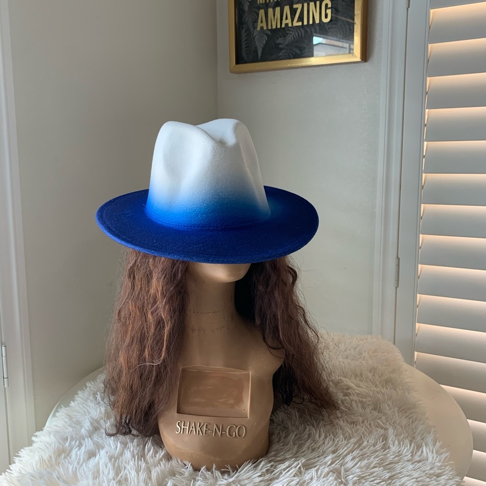 A winter white and royal blue hat 35%polyester  65% polyester
